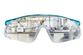 The image depicts a laboratory scene as seen through a pair of safety goggles. The goggles provide a clear, protective lens view of several scientists engaged in different activities within a well-equipped laboratory. The image emphasizes the importance of safety and precision in scientific environments, with the safety goggles symbolizing the protection and focus necessary for conducting experiments. The lab setting includes various scientific instruments and equipment, with the scientists wearing lab coats, indicating a professional research or experimental context.