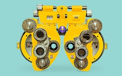 Vibrant yellow manual refractor optical view tester represents MilliporeSigma as a high-quality raw materials provider to support the development and manufacturing of intraocular and contact lenses.