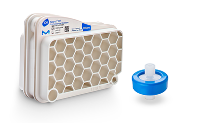 A set of two laboratory filtration components. On the left, a white filter cartridge with a honeycomb structure. On the right, a blue and white connector piece used for fluid transfer.