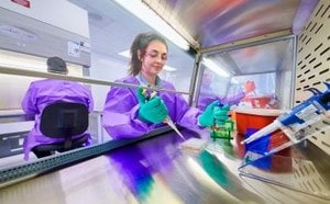 Person in lab performing biosafety testing